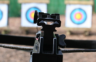 Crossbow iron sights and target at Adventure Now Manchester