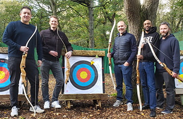 Small group of friends at Archery Club at Adventure Now Manchester