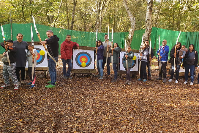 Large family group at Archery Club at Adventure Now Manchester