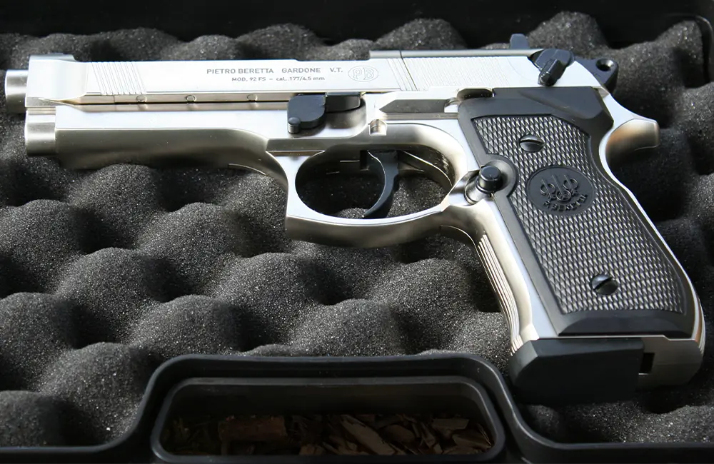 Beretta M92 FS chrome air pistol in a carrying case at Adventure Now Manchester