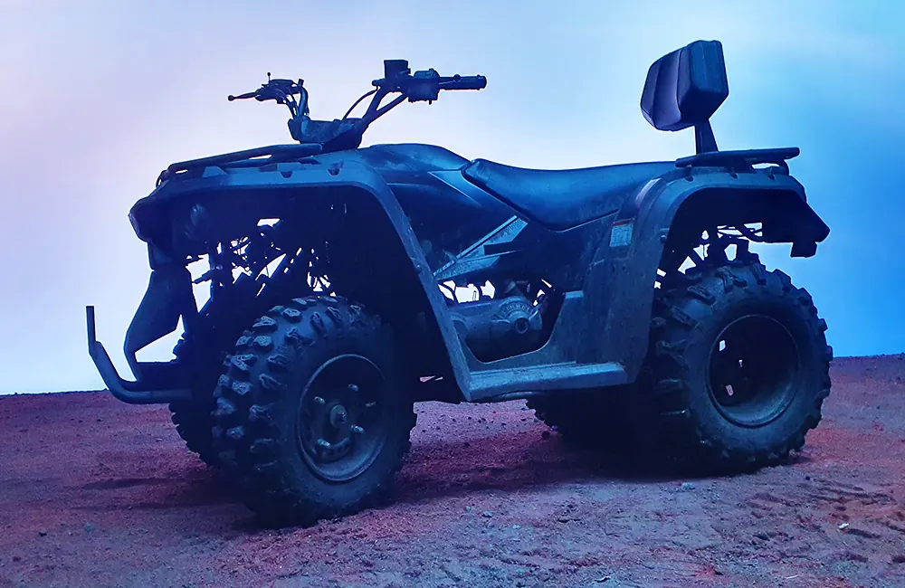 Quad bike on a stage at a film shoot with dimmed lighting