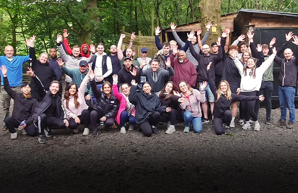 Large corporate group photo after having a team activity day at Adventure Now