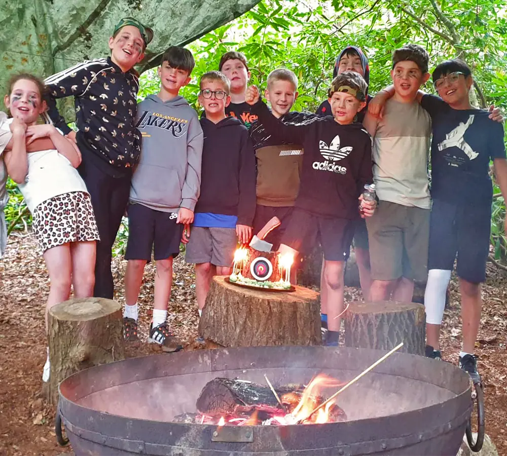 Kids birthday party group photo after roasting marshmallows